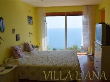 Фото номера Дом с 4 спальнями Дома для отпуска Villa Liana г. Божурец 24